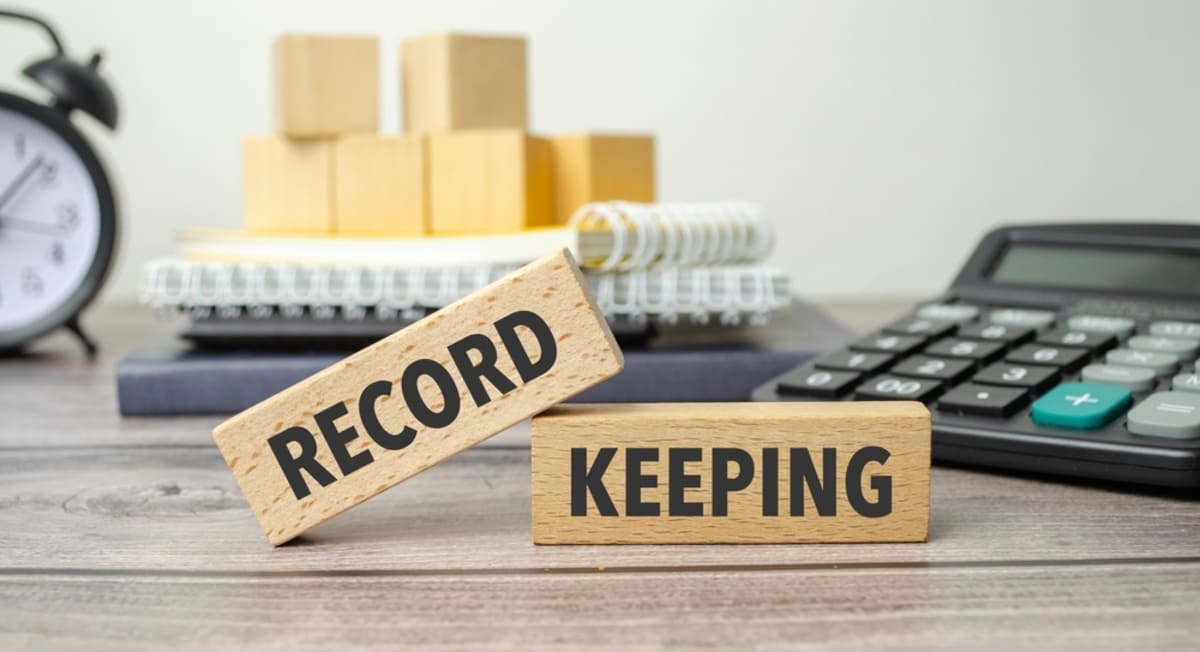 record keeping text on wooden blocks